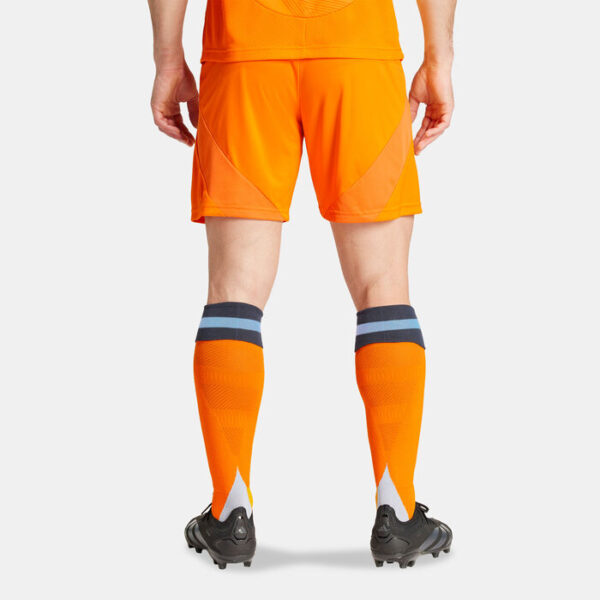 SSS2_ADIU5019_4067897379721_2 | UAE SPORT STORE Back view of a soccer player wearing bright orange shorts and knee-high orange socks with two blue stripes, standing in black cleats on a light background.