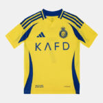 SSS2_ADJP0458_4067903561935_2 | UAE SPORT STORE Yellow Adidas soccer jersey with blue accents, crest on chest, and ‘KAFD’ sponsor across front; short sleeves and striped shoulders pattern.