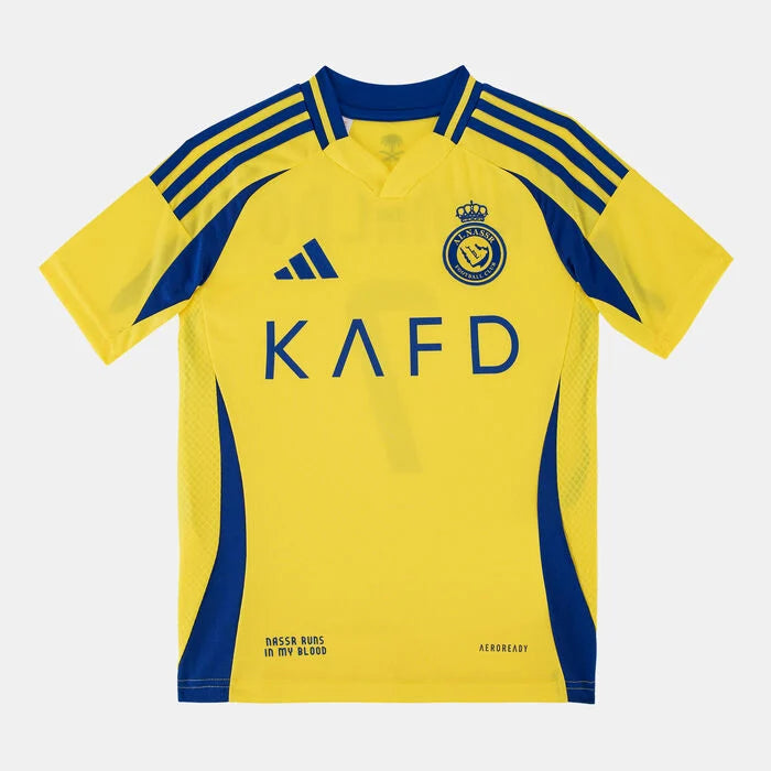 SSS2_ADJP0458_4067903561935_2 | UAE SPORT STORE Yellow Adidas soccer jersey with blue accents, crest on chest, and ‘KAFD’ sponsor across front; short sleeves and striped shoulders pattern.