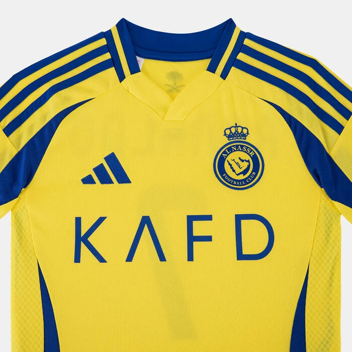 SSS2_ADJP0458_4067903561935_3 | UAE SPORT STORE Yellow soccer jersey with blue trim and stripes, Adidas logo, club crest, and 'KAFD' sponsor text on the front.