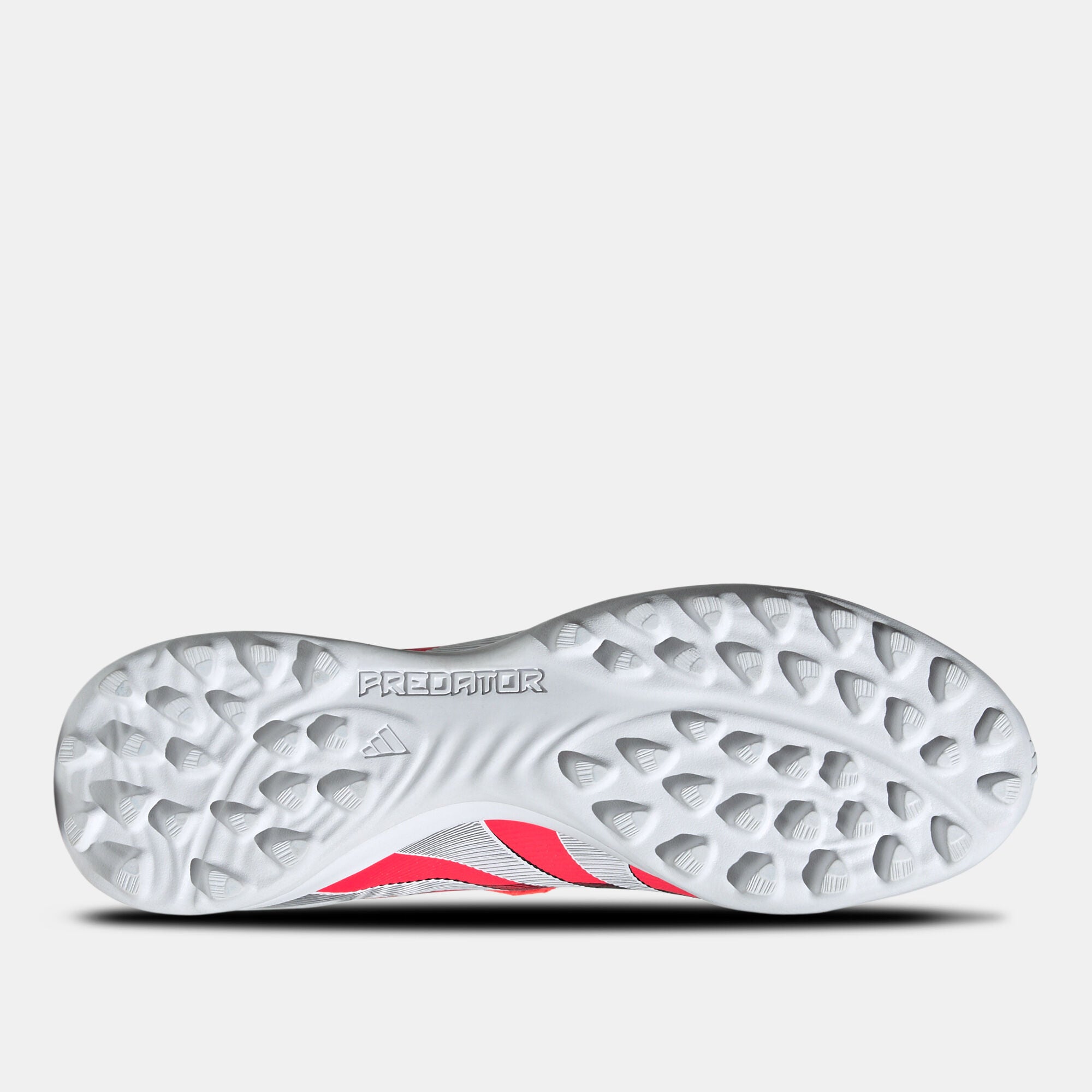 SSS2_ADJS0384_4067903835517_4 | UAE SPORT STORE Close-up of a white soccer cleat sole with multi-pronged studs, featuring the word 'Predator' on the side.
