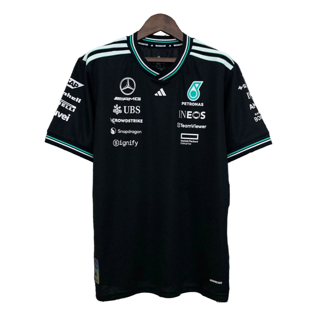 SSSSSSS Black team polo jersey with teal white stripes on shoulders, featuring Mercedes-AMG Petronas logos and various sponsor graphics on the chest and sleeves.