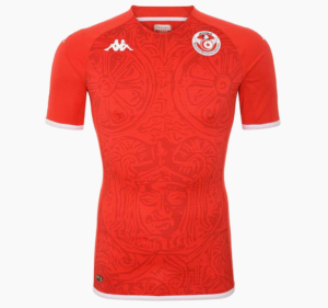 Red soccer jersey with white-trim sleeves and a circular team crest on the left chest, featuring a stylized emblem.