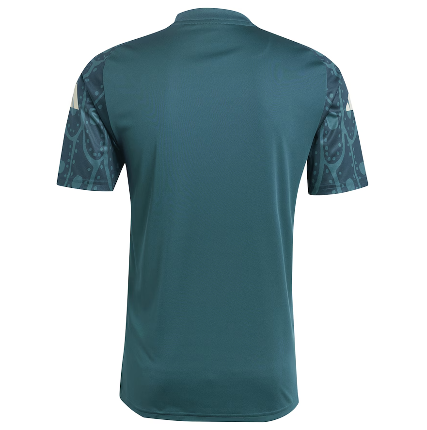 Screenshot2024-08-11234505 | UAE SPORT STORE Teal sports jersey shown from the back with patterned dark sleeves and a curved hem.