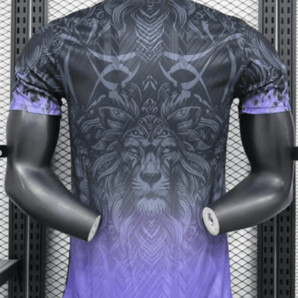 Back view of a black-to-purple gradient athletic shirt with a large ornate lion motif, displayed on a mannequin in a gym setting.