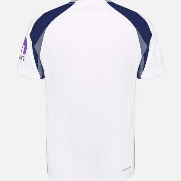 Back view of a white sports jersey with navy blue and gray shoulder panels; purple logo on the left sleeve.