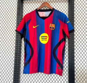 Screenshot2026-01-24at12.31.15-768x735-1 | UAE SPORT STORE Barcelona football jersey with red and blue vertical stripes, Nike swoosh, and Spotify sponsor logo on the chest, hanging on a rack.