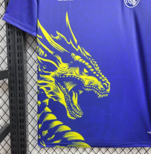 Screenshot_2024-06-24_205947 | UAE SPORT STORE Blue t-shirt featuring a large yellow dragon graphic along the left front, with detailed scales and an open mouth.