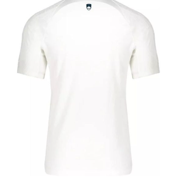 White short-sleeve T-shirt viewed from the back, with a small dark crest at the neckline