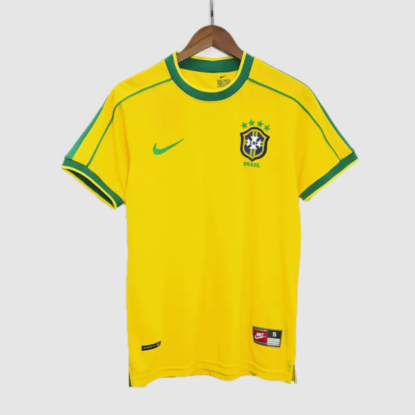 Yellow Brazil national team soccer jersey with green trim, Nike swoosh, and crest with stars on the chest.