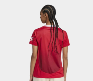 Back view of a person wearing a red athletic jersey with white trim and braided hair.