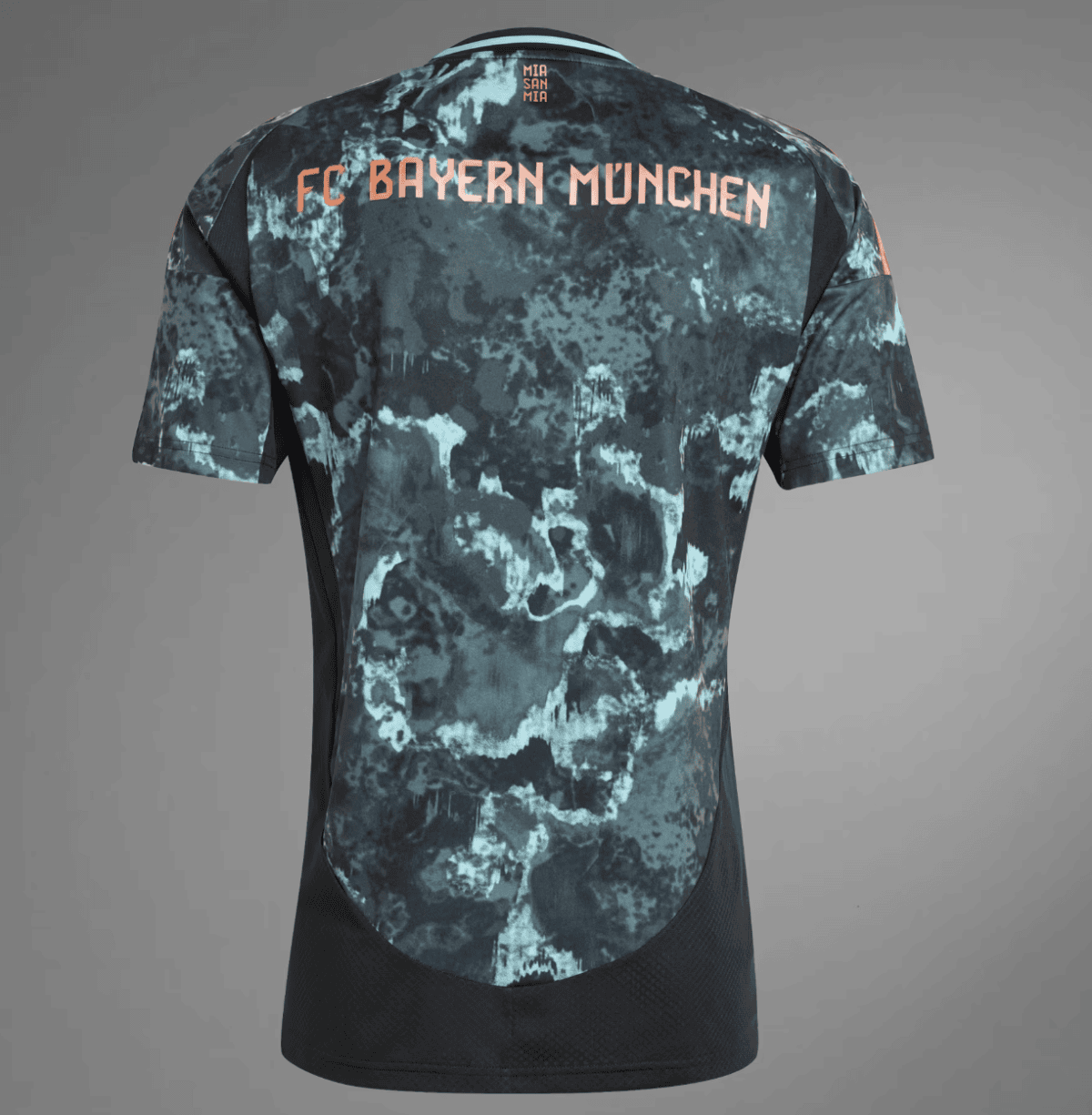 Back view of a camouflage-pattern FC Bayern München soccer jersey with turquoise and black tones and coral lettering.