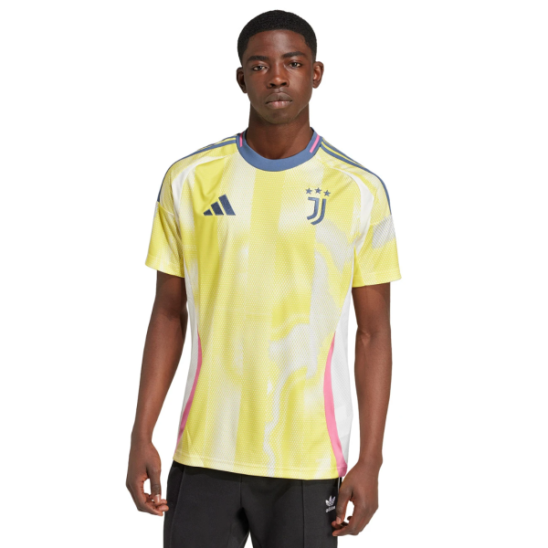 Male model wearing a bright yellow Juventus soccer jersey with Adidas logo against a white background.