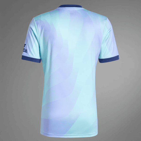 Back view of a pastel blue and teal sports jersey with purple swirl pattern and dark blue collar and cuffs