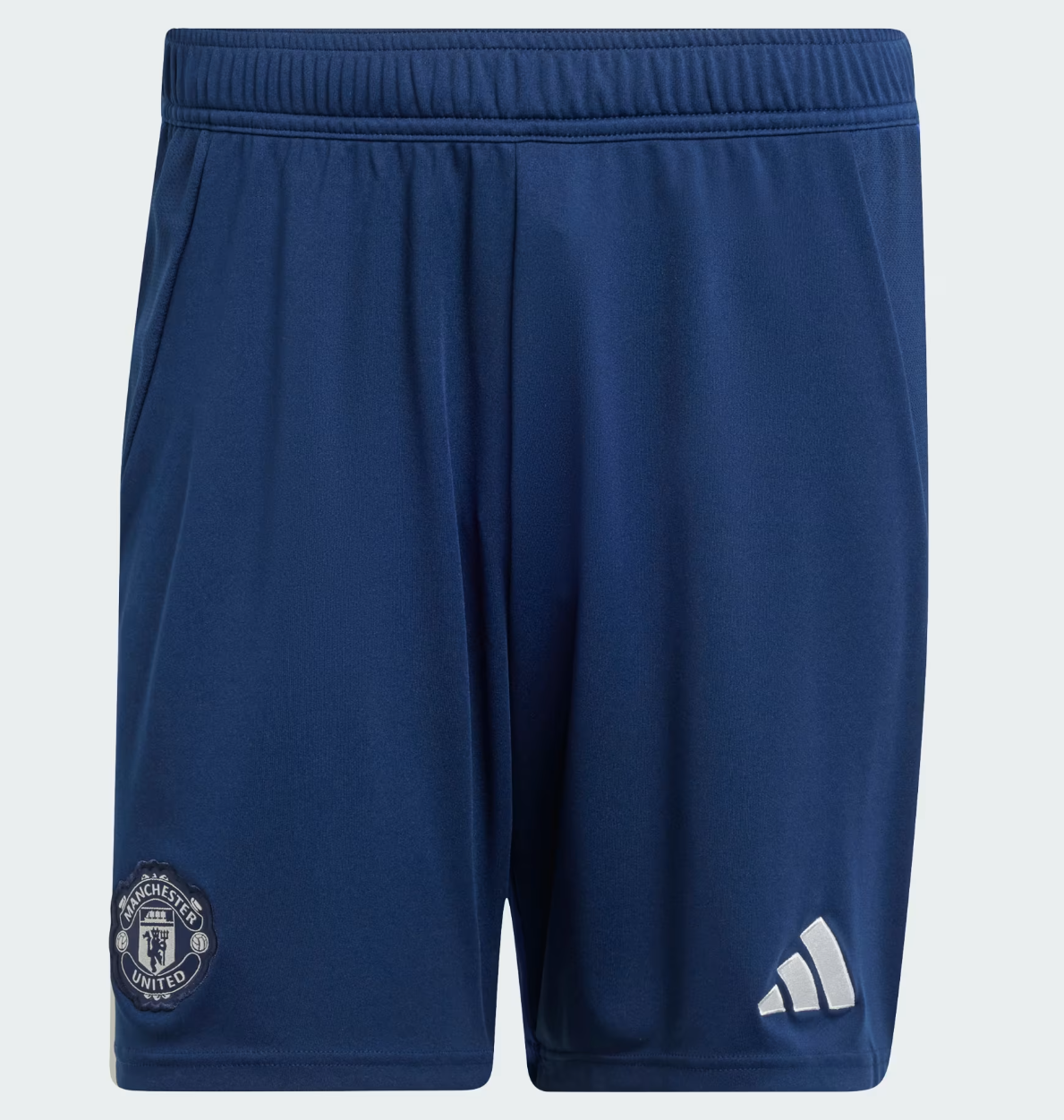 Screenshot_2024-09-18_222540 | UAE SPORT STORE Blue Manchester United shorts with club crest on the left leg and Adidas logo on the right leg.