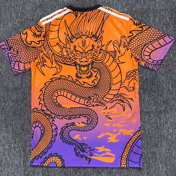 Bright orange-to-purple graphic T-shirt featuring a bold black dragon design across the front and sleeves, in a mythic pose.