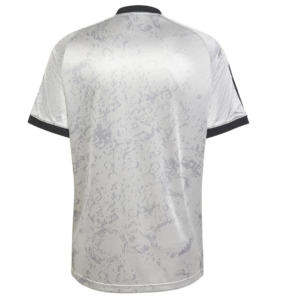 Back view of a white and gray camouflage sports jersey with black collar and sleeve cuffs.