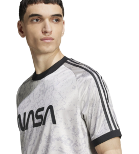 Male model wearing a gray camouflage NASA t-shirt with black collar and stripes on the sleeves.