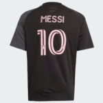 Black Messi jersey back view with pink number 10 and name, MLS logos on digits, and 'Freedom to Dream' text at the neck area