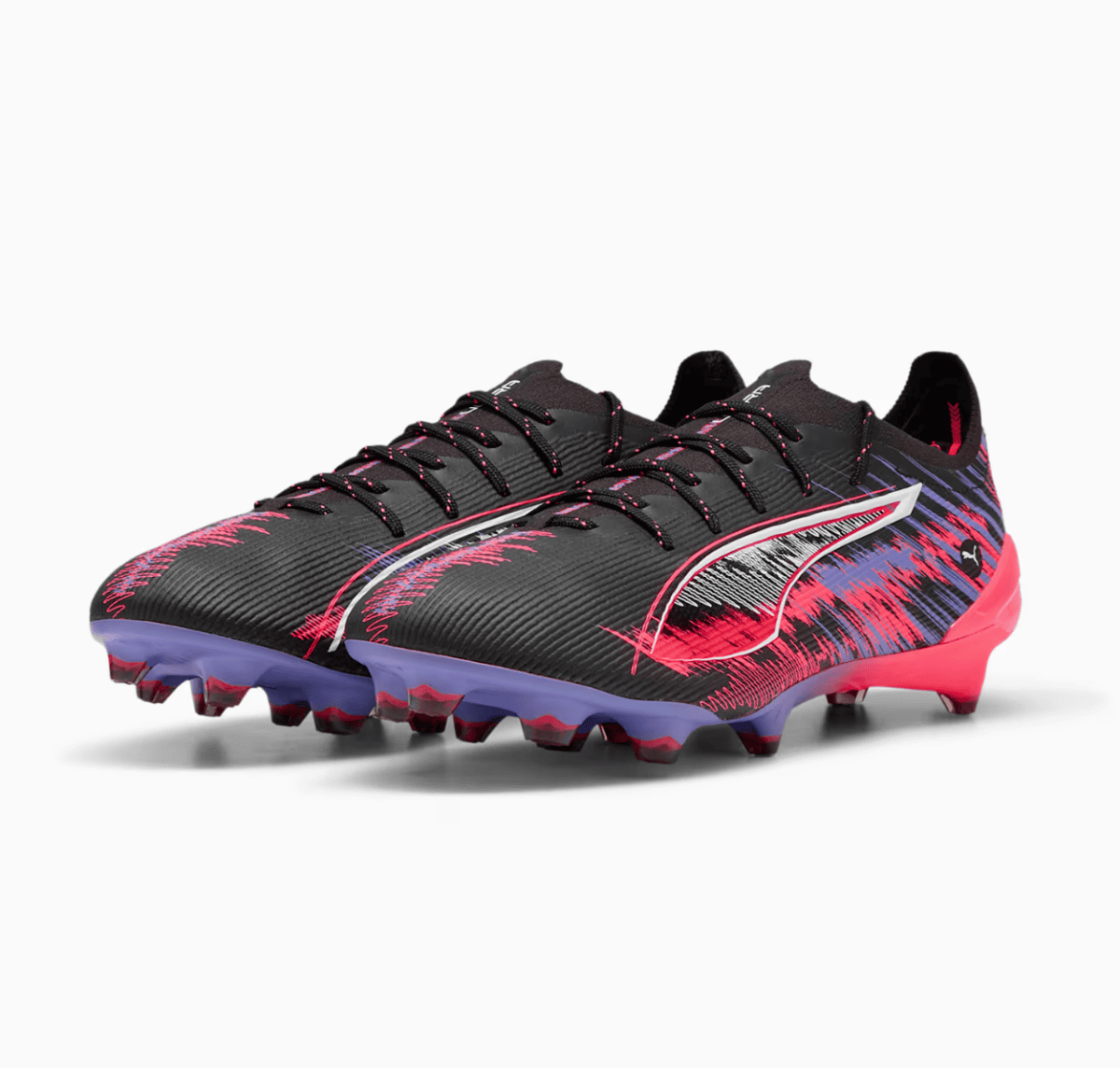 Black and pink gradient soccer cleats with a white curved stripe and purple outsole, kicked-stud design for firm ground play at the front and base color black/red accents