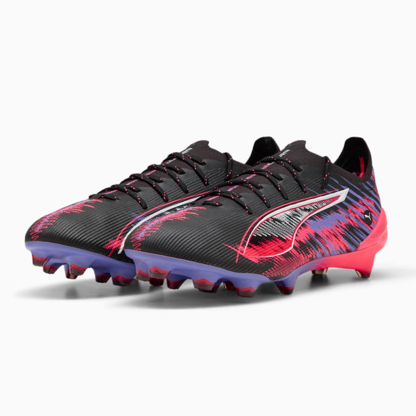 Black and pink gradient soccer cleats with a white curved stripe and purple outsole, kicked-stud design for firm ground play at the front and base color black/red accents
