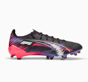 Colorful football boot with black, pink, and purple brush stroke design and a bright pink heel, featuring a white logo on the side.