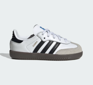 White Adidas Samba-style sneaker with black stripes, white upper, beige suede toe cap, and brown sole, side view