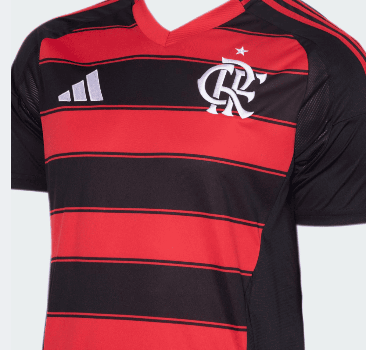 Red and black striped Flamengo soccer jersey with a white club crest and Adidas logo on the chest.