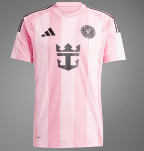 Pink striped soccer jersey with Adidas logo on the left and a circular club crest on the right chest, short sleeves, against a gray background.