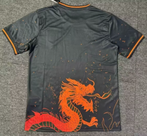 Back of a black athletic jersey with an orange dragon graphic near the bottom-left and orange trim on the sleeves.