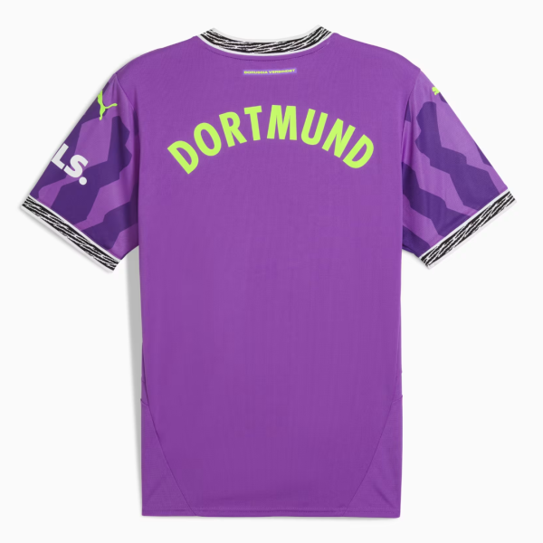 Purple Borussia Dortmund jersey back with lime-green 'DORTMUND' curved text, camo sleeves, zebra-stripe collar, and small PUMA logos.