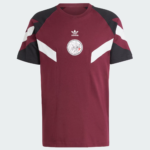 Maroon Adidas short-sleeve T-shirt with black shoulders and white chevron panels, featuring a round emblem on the chest.