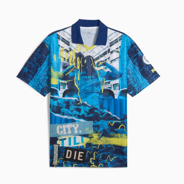 Bright blue graphic polo shirt with an urban collage print and a navy collar.