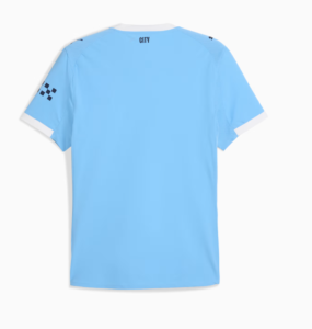Light blue soccer jersey back view with white collar and cuffs; 'CITY' at the neck and a black checker pattern on the left sleeve.