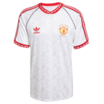 White adidas Manchester United football jersey with red stripes and club crest on the chest, featuring a geometric pattern and red trim on collar and sleeves.