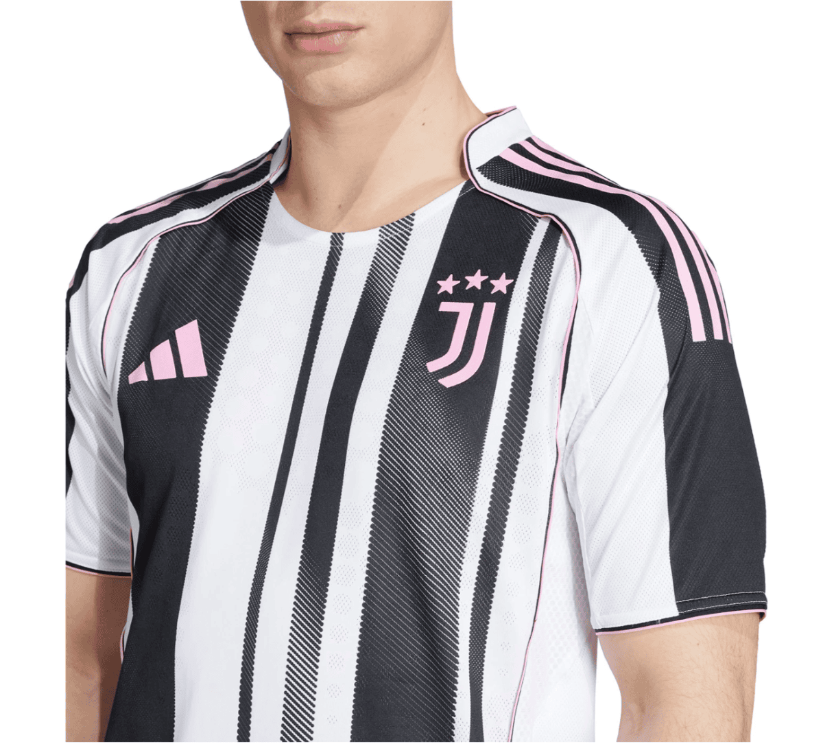 Close-up of a man wearing a white and black striped soccer jersey with pink trim, featuring the Juventus badge with three pink stars on the left chest and a pink Adidas logo.