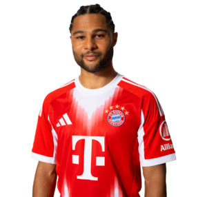 Male soccer player wearing a red FC Bayern jersey, facing the camera with a neutral smile.