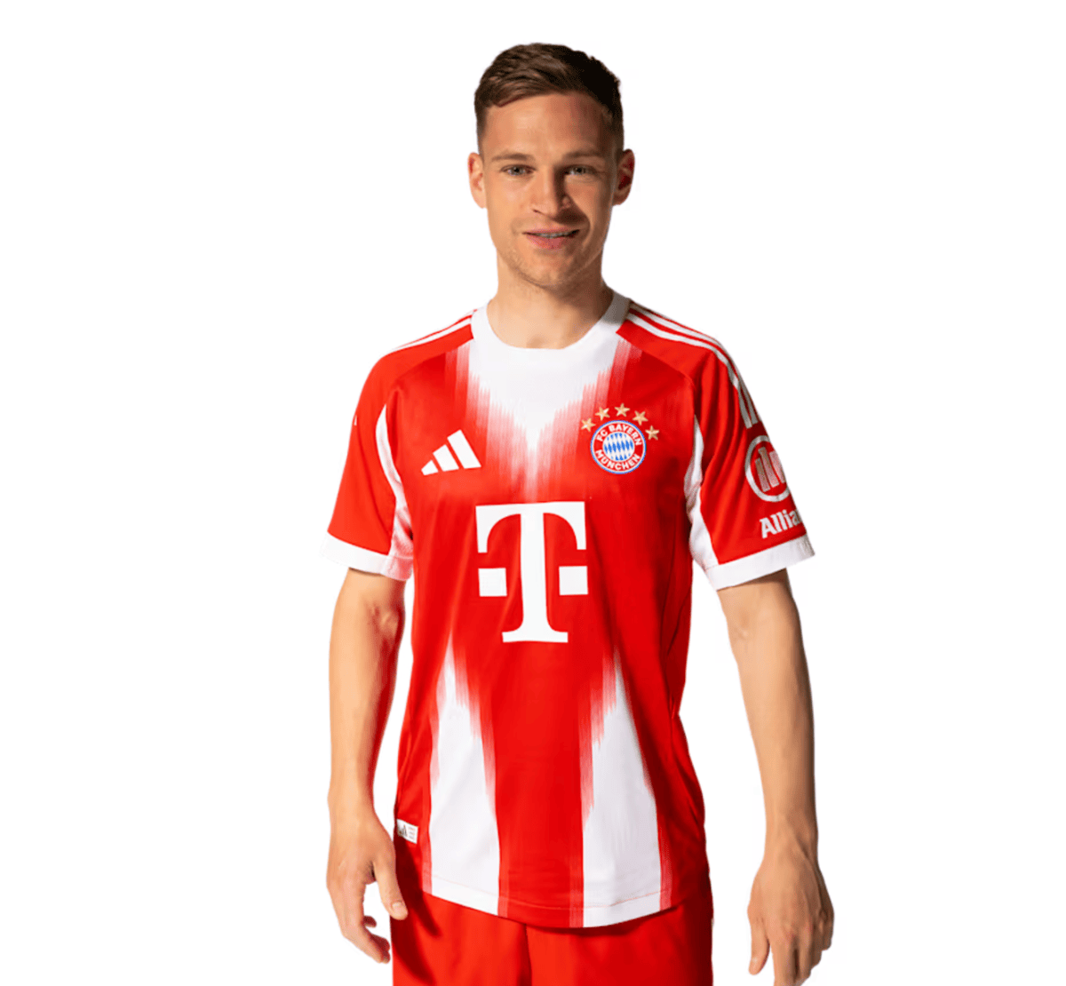 Young man in a red Bayern Munich home soccer jersey, smiling, against a white background.