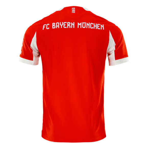 Red football jersey viewed from the back with white sleeve panels and 'FC BAYERN MÜNCHEN' in white across the shoulders.