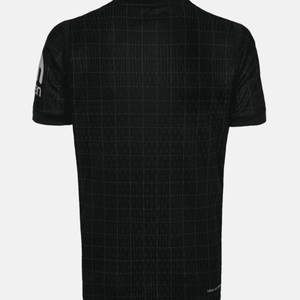 Black short-sleeve t-shirt with a subtle grid pattern, back view; small white logo on the left sleeve edge.