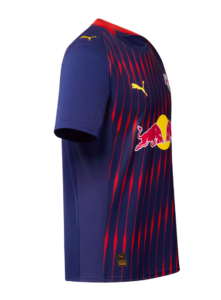 Purple and navy football jersey with red diagonal stripes and Red Bull logo on the chest; Puma branding visible on sleeve and front