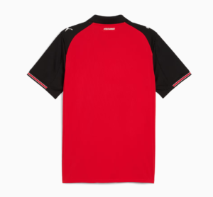 Red sports jersey with black sleeves and white-trimmed cuffs, viewed from the back, featuring a small white hashtag near the neckline (#TOUTDONNER).