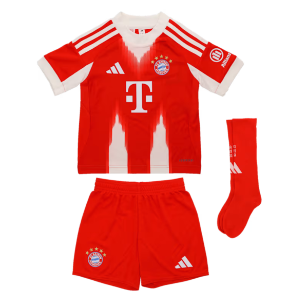 Red Bayern Munich football kit: jersey, shorts, and socks with white accents, crest, and sponsor logo on jersey.