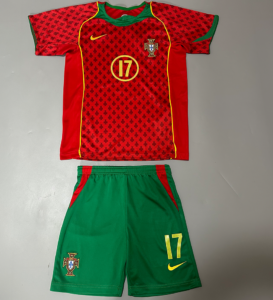 Portugal football kit: red patterned jersey with crest, green shorts, number 17, and yellow Nike swoosh.