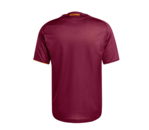 Back view of a burgundy soccer jersey with short sleeves and yellow-accent trim; small 'AS ROMA' logo at the neck area.