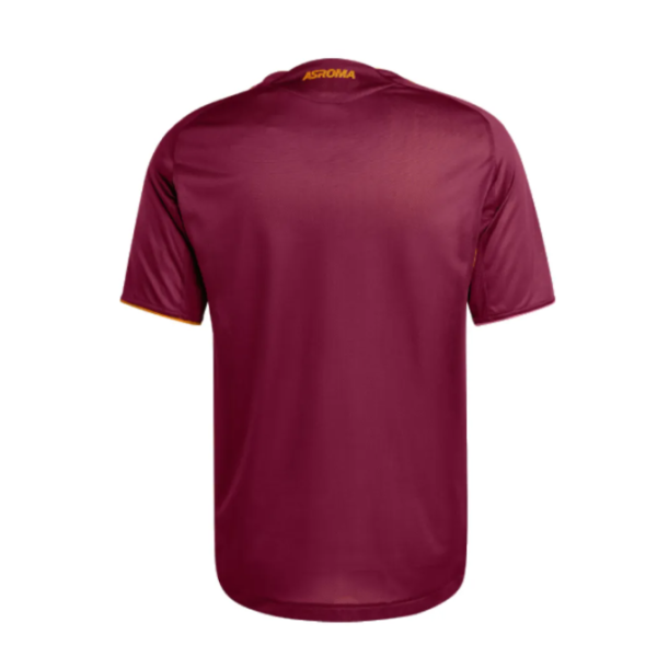 Back view of a burgundy soccer jersey with short sleeves and yellow-accent trim; small 'AS ROMA' logo at the neck area.