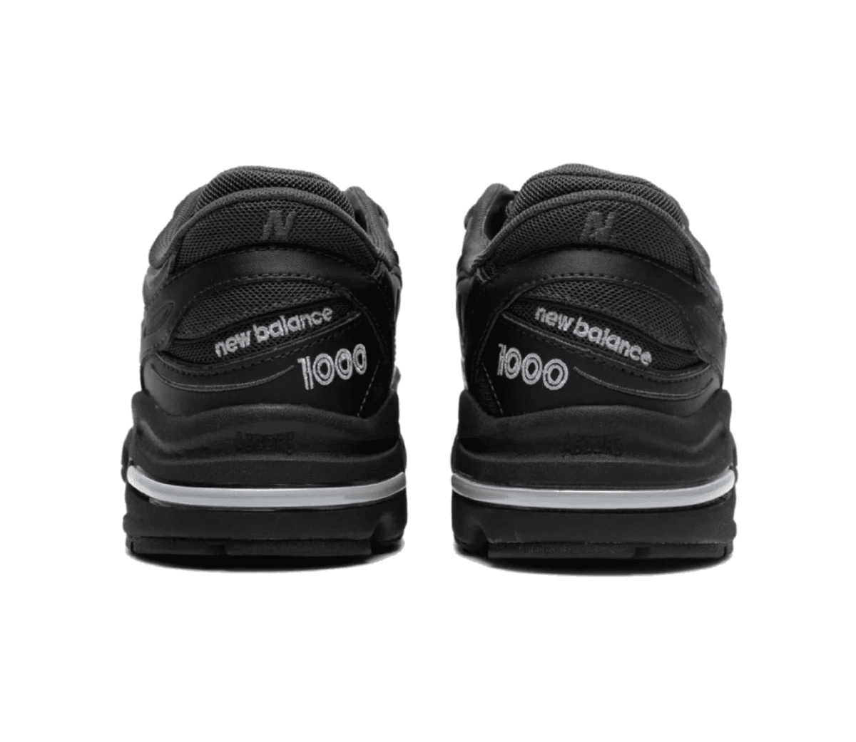 Back view of black New Balance 1000 sneakers, showing branding on the heels (NB and 1000).