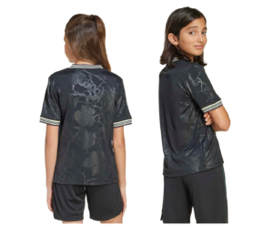 Screenshot_2025-10-12_200022 | UAE SPORT STORE Two young girls model a dark floral-patterned short-sleeve shirt with striped cuffs, shown from back (left) and side (right).