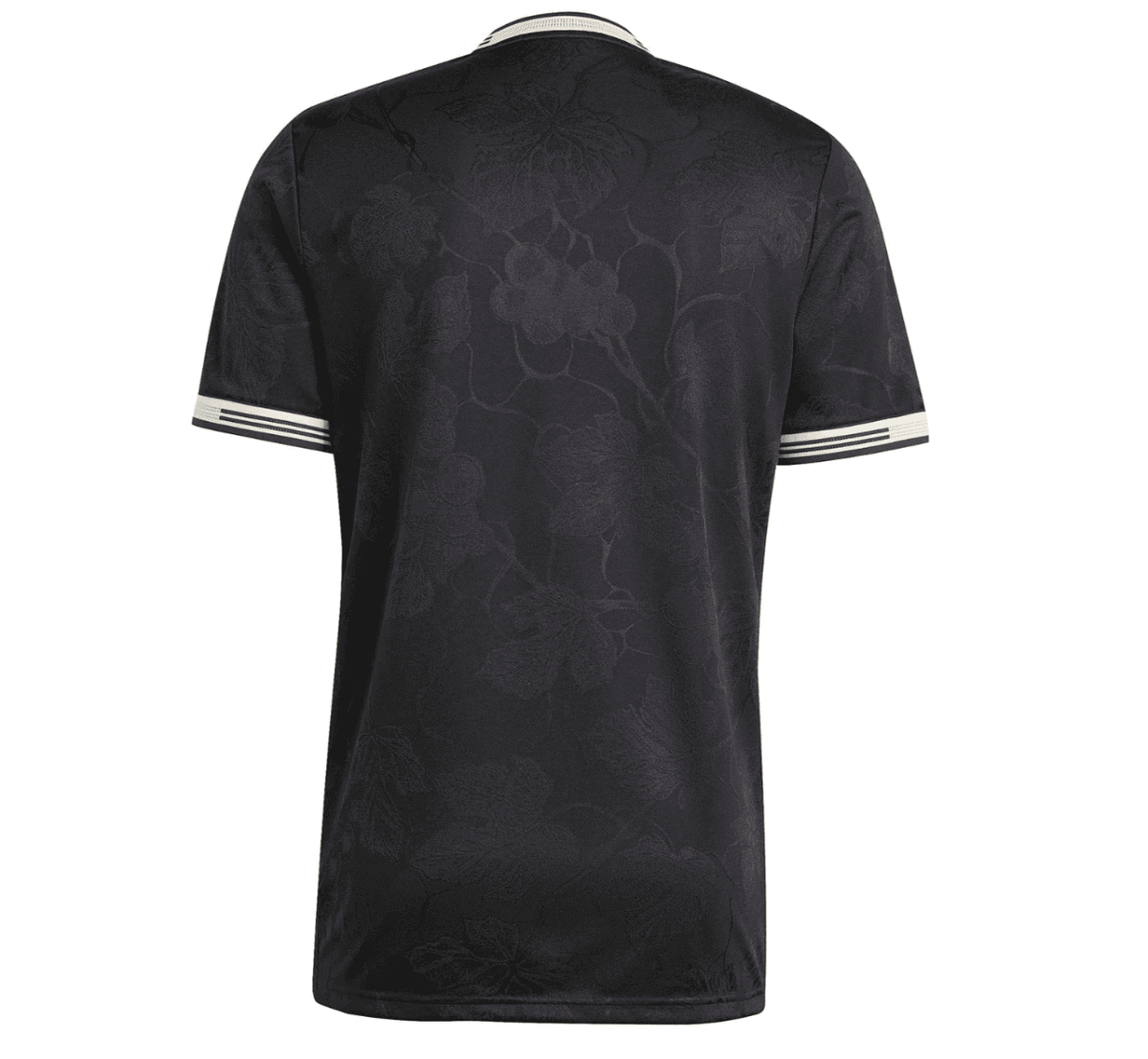 Back view of a black short-sleeve polo with a subtle floral jacquard pattern and cream striped cuffs.