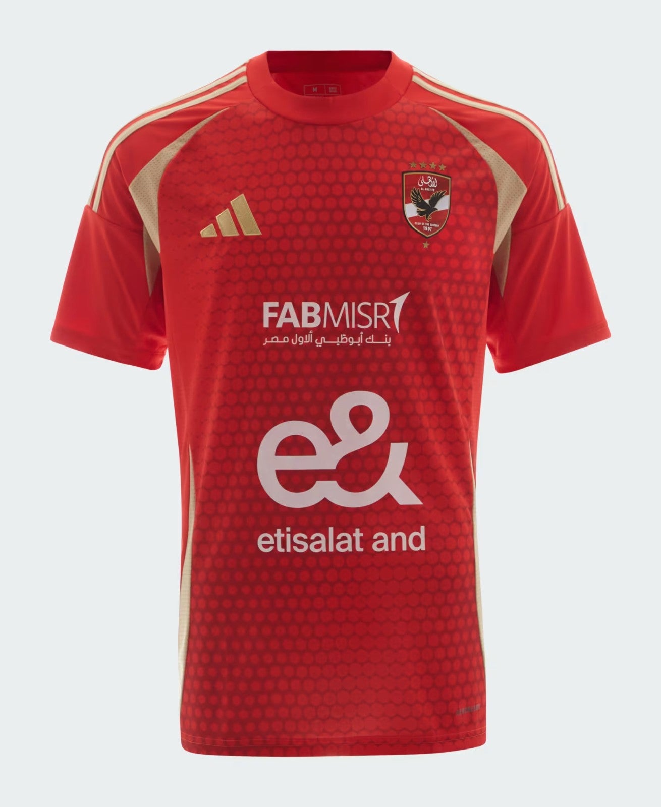 TakOW8V6fyIrHDl_c3d49c4b-e733-442a-9724-e2518cf4b832 | UAE SPORT STORE Red soccer jersey front view with honeycomb pattern, Adidas logo, club crest, and sponsor text (Etisalat).